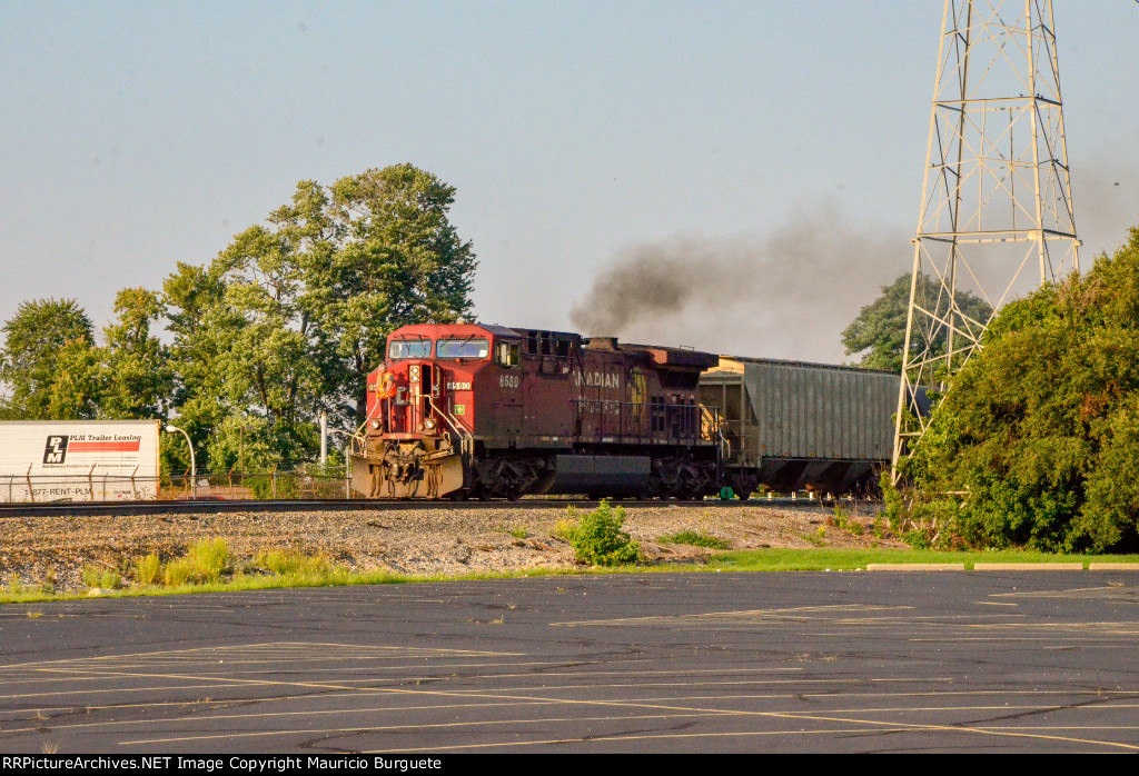 CP AC44CW Locomotive leading a train